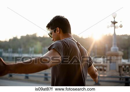 Jogger taking break on bridge, Arroyo Seco Park, Pasadena, California, USA View Large Photo Image Stock Image - Jogger taking break on bridge, Arroyo Seco Park, Pasadena, California, USA. Fotosearch
