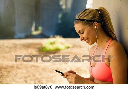Jogger taking break under arch bridge, Arroyo Seco Park, Pasadena, California, USA View Large Photo Image Stock Image - Jogger taking break under arch bridge, Arroyo Seco Park, Pasadena, California, USA. Fotosearch