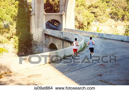 Joggers running on bridge, Arroyo Seco Park, Pasadena, California, USA View Large Photo Image Picture - Joggers running on bridge, Arroyo Seco Park, Pasadena, California, USA. Fotosearch
