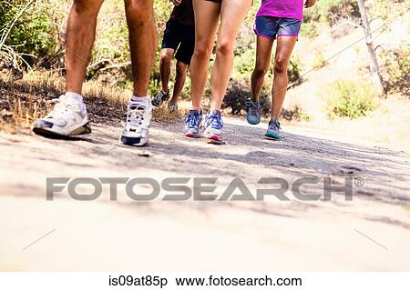 Joggers running, view of feet View Large Photo Image Stock Photography - Joggers running, view of feet. Fotosearch