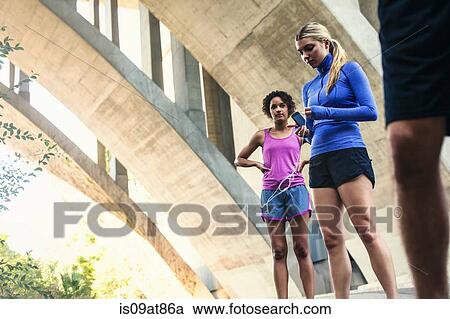 Joggers taking break on bridge, Arroyo Seco Park, Pasadena, California, USA View Large Photo Image Stock Image - Joggers taking break on bridge, Arroyo Seco Park, Pasadena, California, USA. Fotosearch