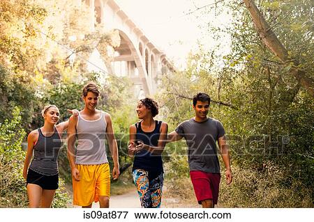 Stock Photo - Joggers walking and chatting, Arroyo Seco Park, Pasadena, California, USA. Fotosearch