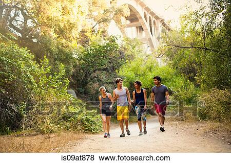 Joggers walking and chatting, Arroyo Seco Park, Pasadena, California, USA View Large Photo Image Stock Photo - Joggers walking and chatting, Arroyo Seco Park, Pasadena, California, USA. Fotosearch