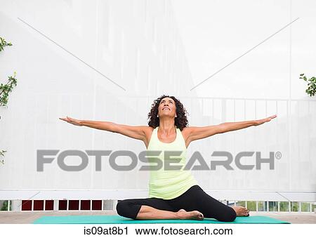 Mature woman practicing yoga View Large Photo Image Stock Image - Mature woman practicing yoga. Fotosearch