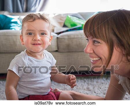 Mother and toddler playing together View Large Photo Image Stock Photo - Mother and toddler playing together. Fotosearch