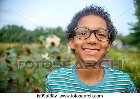 Portrait of boy in farm field View Large Photo Image Stock Photo - Portrait of boy in farm field. Fotosearch
