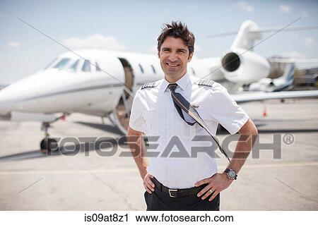 Portrait Of Male Private Jet Pilots At Airport Stock Image Is09at8z1 Fotosearch