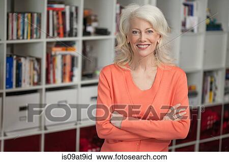 Portrait of mature woman, indoors View Large Photo Image Stock Image - Portrait of mature woman, indoors. Fotosearch