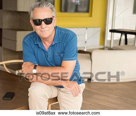 Portrait of senior man wearing sunglasses View Large Photo Image Stock Photo - Portrait of senior man wearing sunglasses. Fotosearch