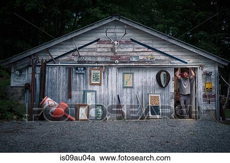 Portrait of wood artist standing in doorway of workshop View Large Photo Image Stock Image - Portrait of wood artist standing in doorway of workshop. Fotosearch