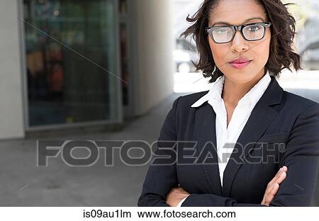 Portrait of young businesswoman, outdoors View Large Photo Image Picture - Portrait of young businesswoman, outdoors. Fotosearch