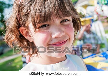 Portrait of young girl, outdoors View Large Photo Image Stock Photo - Portrait of young girl, outdoors. Fotosearch