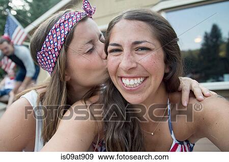 Self portrait of two young women celebrating Independence Day, USA View Large Photo Image Stock Photo - Self portrait of two young women celebrating Independence Day, USA. Fotosearch