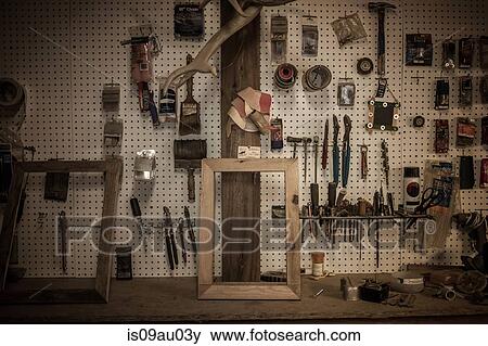 Tools hanging in artist's workshop View Large Photo Image Stock Photo - Tools hanging in artist's workshop. Fotosearch