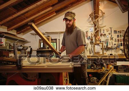 Wood artist in workshop View Large Photo Image Stock Photo - Wood artist in workshop. Fotosearch