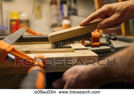 Picture - Wood artist working in workshop, close-up. Fotosearch