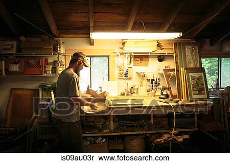 Wood artist working in workshop View Large Photo Image Stock Photography - Wood artist working in workshop. Fotosearch