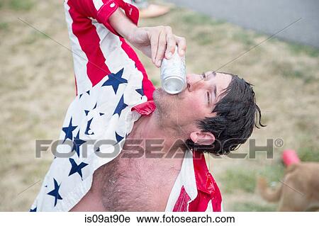 Young man kissing beer can celebrating Independence Day, USA View Large Photo Image Stock Image - Young man kissing beer can celebrating Independence Day, USA. Fotosearch