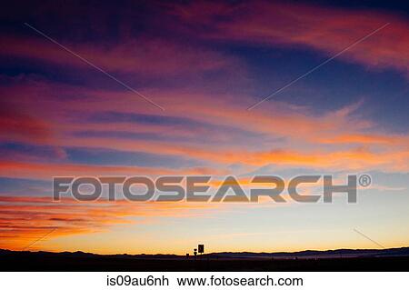 Dramatic orange colour cloudscape in evening sky, Bonneville, Utah, USA View Large Photo Image Stock Image - Dramatic orange colour cloudscape in evening sky, Bonneville, Utah, USA. Fotosearch