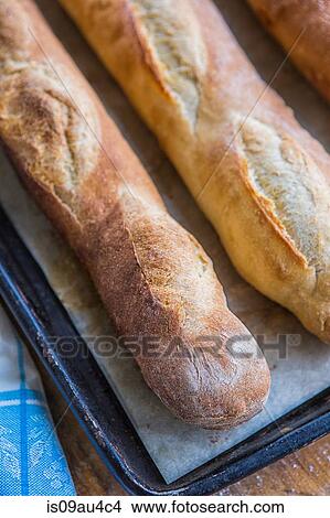 Freshly baked baguettes, elevated view View Large Photo Image Picture - Freshly baked baguettes, elevated view. Fotosearch