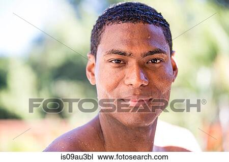 Head and shoulder portrait of wet haired mid adult man looking at camera smiling View Large Photo Image Stock Image - Head and shoulder portrait of wet haired mid adult man looking at camera smiling. Fotosearch