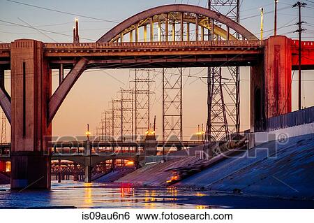 Los Angeles river embankment and 6th and 7th street bridges in the evening, Los Angeles, California, USA View Large Photo Image Stock Photograph - Los Angeles river embankment and 6th and 7th street bridges in the evening, Los Angeles, California, USA. Fotosearch