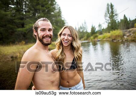Portrait of young couple in river, Lake Tahoe, Nevada, USA View Large Photo Image Stock Image - Portrait of young couple in river, Lake Tahoe, Nevada, USA. Fotosearch