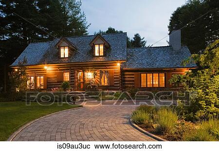 Reconstructed 1976 cottage style log home facade at dusk, Quebec, Canada View Large Photo Image Stock Image - Reconstructed 1976 cottage style log home facade at dusk, Quebec, Canada. Fotosearch