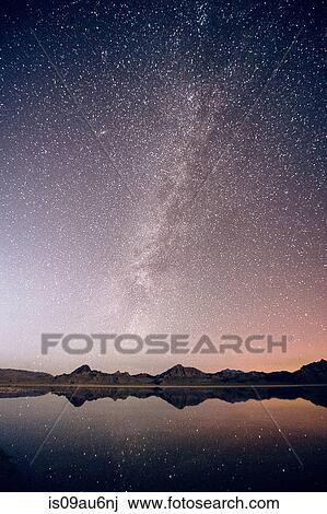 Reflecting pool of mountain range and Milky Way in dramatic night sky, Bonneville, Utah, USA View Large Photo Image Stock Image - Reflecting pool of mountain range and Milky Way in dramatic night sky, Bonneville, Utah, USA. Fotosearch