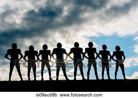 Silhouette of group of young american football players, standing in row, hands on hips View Large Photo Image Stock Image - Silhouette of group of young american football players, standing in row, hands on hips. Fotosearch