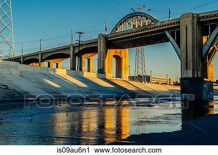 Sunlight on Los Angeles river embankment and 6th street bridge, Los Angeles, California, USA View Large Photo Image Stock Image - Sunlight on Los Angeles river embankment and 6th street bridge, Los Angeles, California, USA. Fotosearch