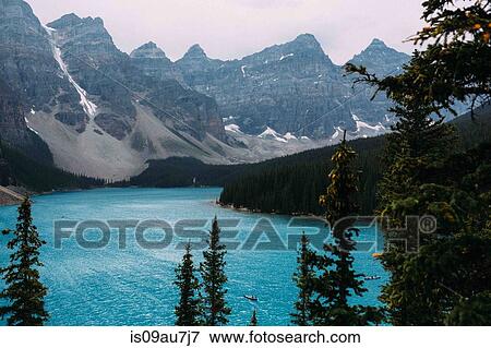 Elevated view of Moraine lake below mountain range, Banff National Park, Alberta Canada View Large Photo Image Stock Photo - Elevated view of Moraine lake below mountain range, Banff National Park, Alberta Canada. Fotosearch