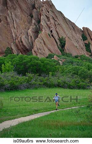 Female trail runner running along dirt track, Colorado Front Range, Boulder, USA View Large Photo Image Stock Photograph - Female trail runner running along dirt track, Colorado Front Range, Boulder, USA. Fotosearch