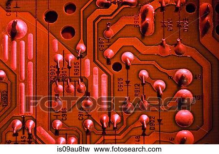 Overhead close up of red colour circuit board View Large Photo Image Stock Photo - Overhead close up of red colour circuit board. Fotosearch