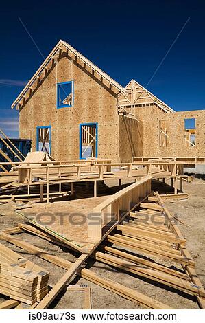 Residential cottage style home facade under construction, Quebec, Canada View Large Photo Image Stock Photograph - Residential cottage style home facade under construction, Quebec, Canada. Fotosearch