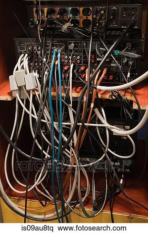 Tangled cables connecting electrical equipment View Large Photo Image Stock Photography - Tangled cables connecting electrical equipment. Fotosearch