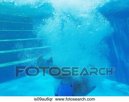 Underwater view of boy sinking to bottom of swimming pool View Large Photo Image Stock Photography - Underwater view of boy sinking to bottom of swimming pool. Fotosearch