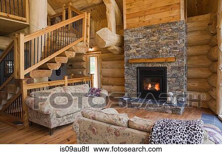 Wood burner in living room of Eastern white pine log cabin View Large Photo Image Stock Image - Wood burner in living room of Eastern white pine log cabin. Fotosearch
