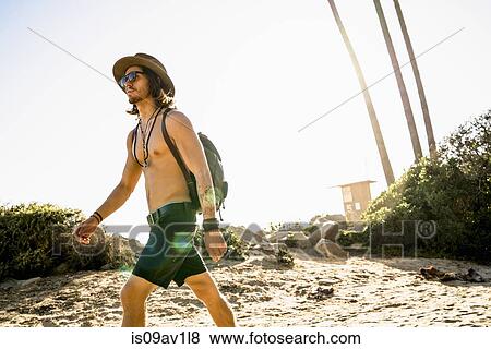 Young man exploring Newport Beach, California, USA View Large Photo Image Stock Photo - Young man exploring Newport Beach, California, USA. Fotosearch