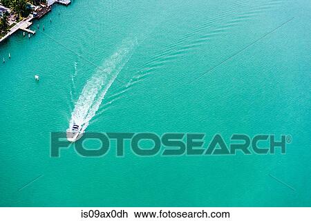Aerial view of boat and boat wake, Biscayne Bay, Miami, Florida, USA View Large Photo Image Stock Image - Aerial view of boat and boat wake, Biscayne Bay, Miami, Florida, USA. Fotosearch