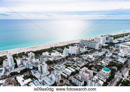 Stock Image - Aerial view of buildings and coastline, Miami, Florida, USA. Fotosearch