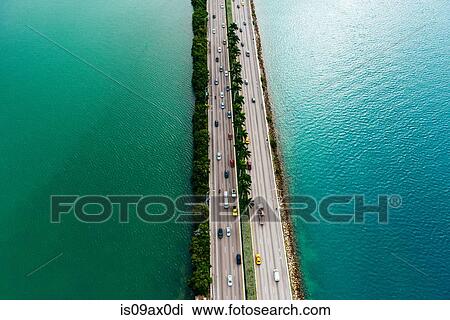 Aerial view of interstate 395 highway through ocean, Biscayne Bay, Miami, Florida, USA View Large Photo Image Stock Image - Aerial view of interstate 395 highway through ocean, Biscayne Bay, Miami, Florida, USA. Fotosearch