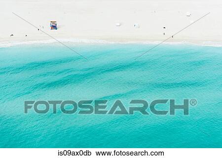 Aerial view of lifeguard tower and tourists by coastline, South beach, Miami, Florida, USA View Large Photo Image Stock Image - Aerial view of lifeguard tower and tourists by coastline, South beach, Miami, Florida, USA. Fotosearch