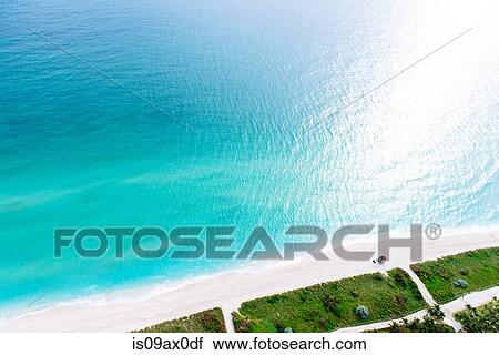 Stock Image - Aerial view of ocean and coastline, Miami, Florida, USA. Fotosearch