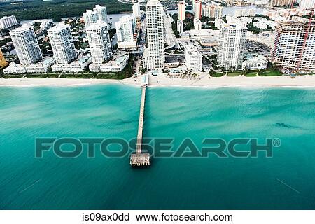Stock Image - Aerial view of pier and skyscrapers, Sunny Isles, Miami, Florida, USA. Fotosearch