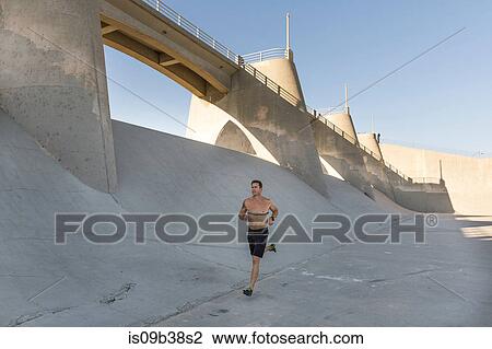 Athlete jogging, Van Nuys, California, USA View Large Photo Image Stock Image - Athlete jogging, Van Nuys, California, USA. Fotosearch