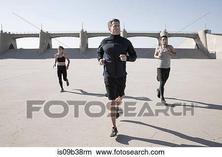 Athletes jogging, Van Nuys, California, USA View Large Photo Image Picture - Athletes jogging, Van Nuys, California, USA. Fotosearch