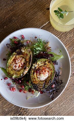 Avocado brunch dish with pomegranate seed and creme fraiche View Large Photo Image Stock Image - Avocado brunch dish with pomegranate seed and creme fraiche. Fotosearch