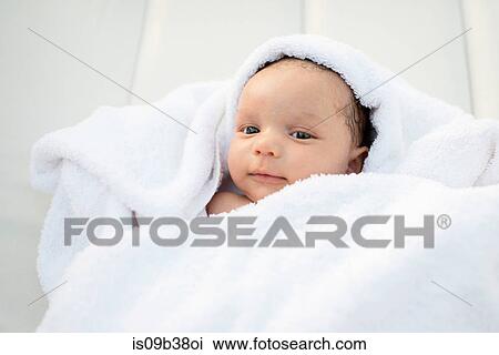 Baby wrapped in towel View Large Photo Image Stock Image - Baby wrapped in towel. Fotosearch
