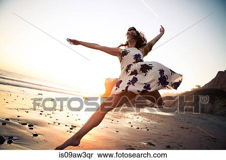 Stock Photography - Ballerina dancing on beach. Fotosearch
